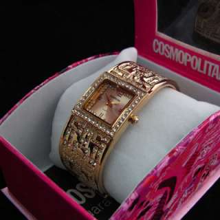 Cosmopolitan Designer Ladies Bangle Watch Gold tone no. 5 Diamante 