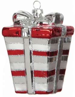 This glass present Christmas ornament is red and white striped and has 