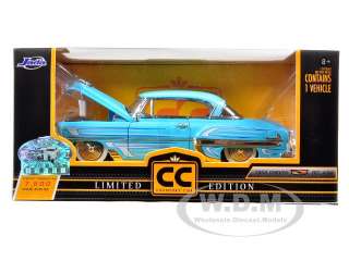 Brand new 1:24 scale diecast model car of 1953 Chevrolet Bel Air Blue 