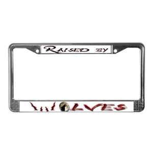  Raised By Wolves Humor License Plate Frame by CafePress 
