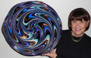 Up for auction is a unique piece of hand blown glass art!!!
