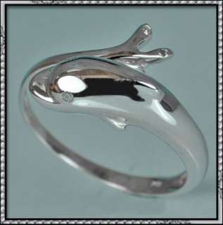 This is a 10K 0.02CT DOLPHIN design real round Diamond ring 