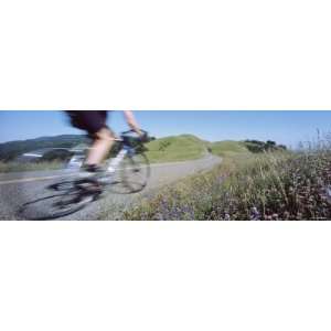  Man Riding a Bicycle, Bolinas Ridge, Marin County, California, USA 