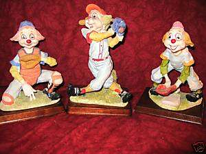 CLOWNS OF BASEBALL FIGURINES ON WOODEN BASES  
