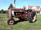 706 Farmall International tractor with New Idea Mounted 2 row Picker