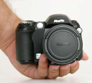 Fuji includes a lens cap and retaining strap, to help protect that big 
