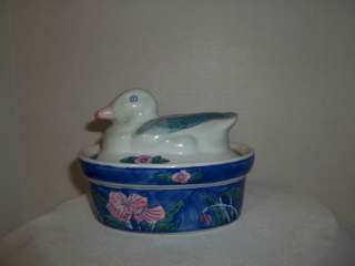 Ben Rikert Nesting Duck Covered Dish , Blue and White with Pink 