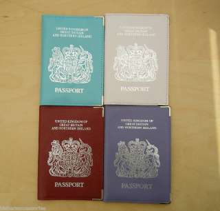 PAIR OF UK LEATHER PASSPORT COVERS ASSORTED COLOURS.  