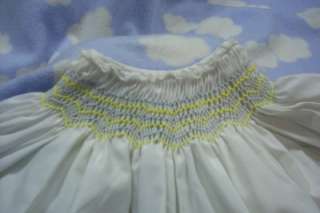 INFANT GIRLS   WHITE DRESS W/BLUE, YELLOW SMOCKING   SIZE 3 MOS  